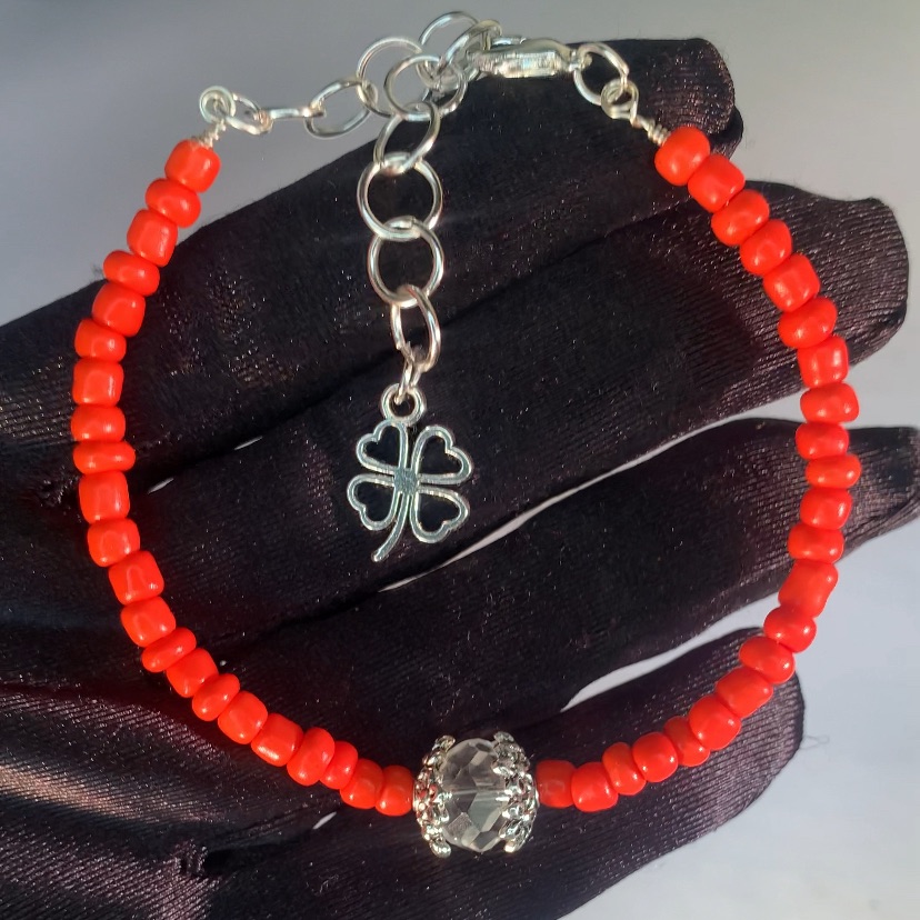 Crimson Clover Designer Red Glass Seed Bead Bracelet With Silver Clover Charm